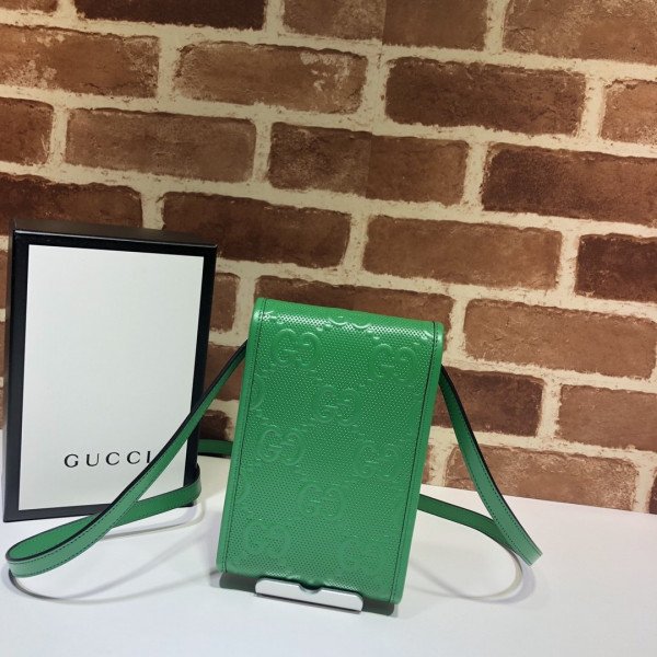 G*u*i gg embossed mini bag