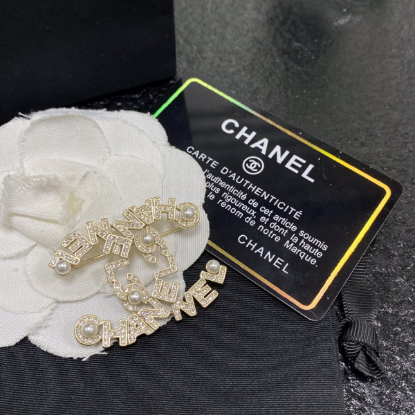 CL BROOCH