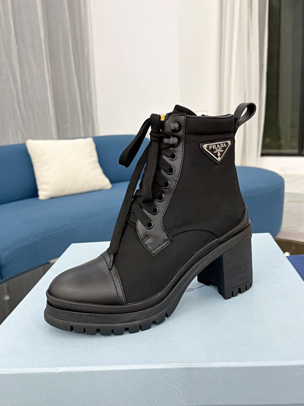 Pra*a brushed leather and nylon laced booties