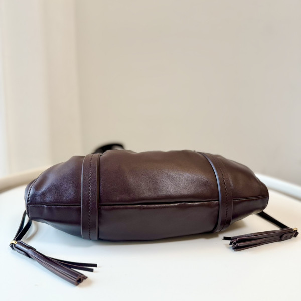 M*um*u joie nappa leather bag