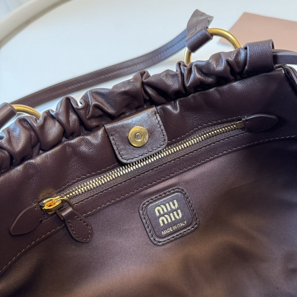 M*um*u joie nappa leather bag